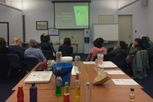 Early childhood educators seated for a presentation