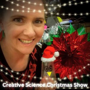 Smiling presenter and Christmas decorations